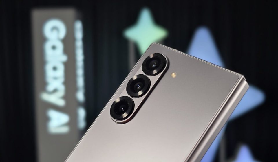 A close up of a silver cell phone