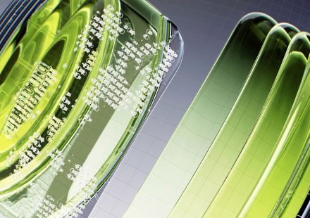 a close up of a green object on a white surface