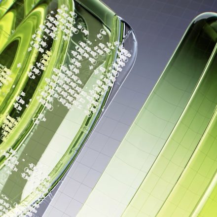 a close up of a green object on a white surface