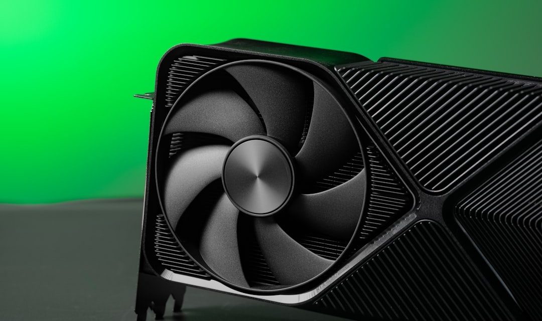 A close up of a computer fan on a table